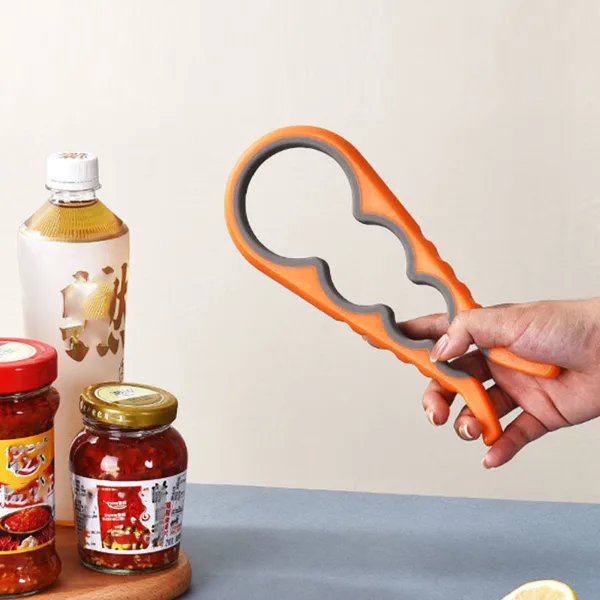 Multifunctional 4-in-1 Kitchen Tool Jar Gripper Lid Opener Can Opener Bottle Opener - Easy to Use Home Essenti